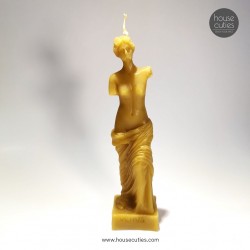 A BEESWAX CANDLE IN THE...